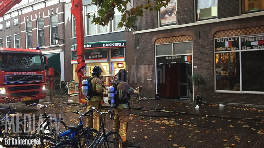 Grote brand in leegstaand winkelpand Lange Kerkstraat Schiedam (video)
